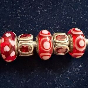 Pandora charms two red stoned, three patterned murano glass